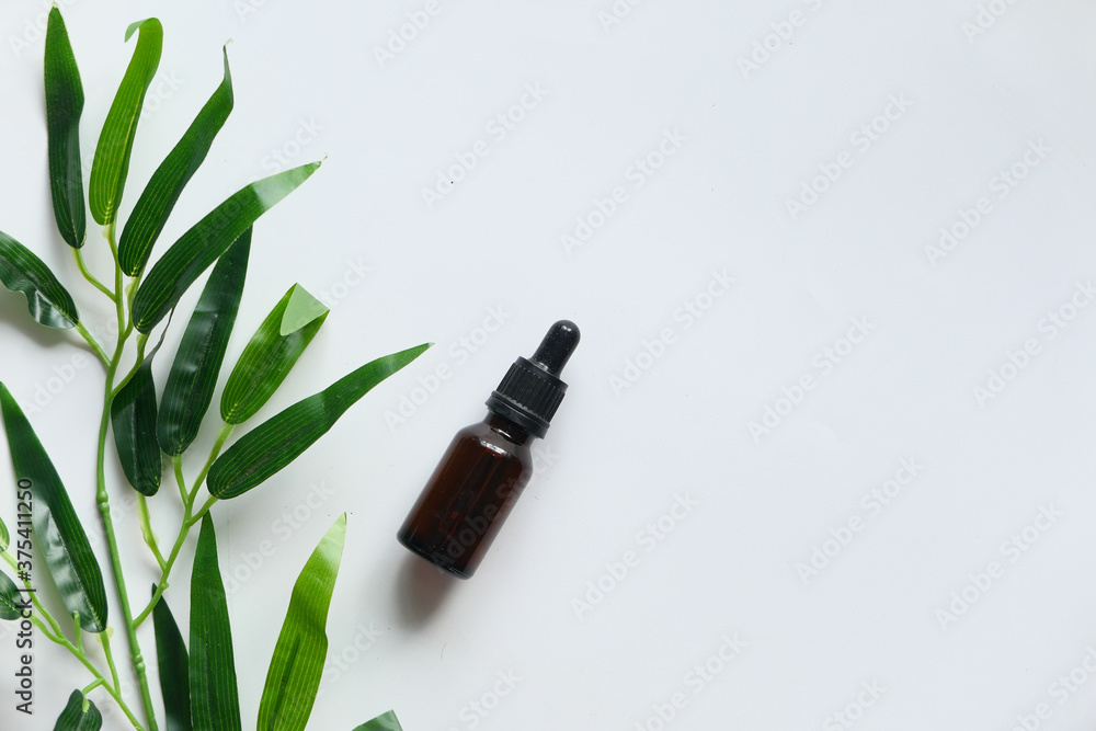 Bottle With Herbs On White Background Top Down Bottle With Herbs On White Background Top Down
