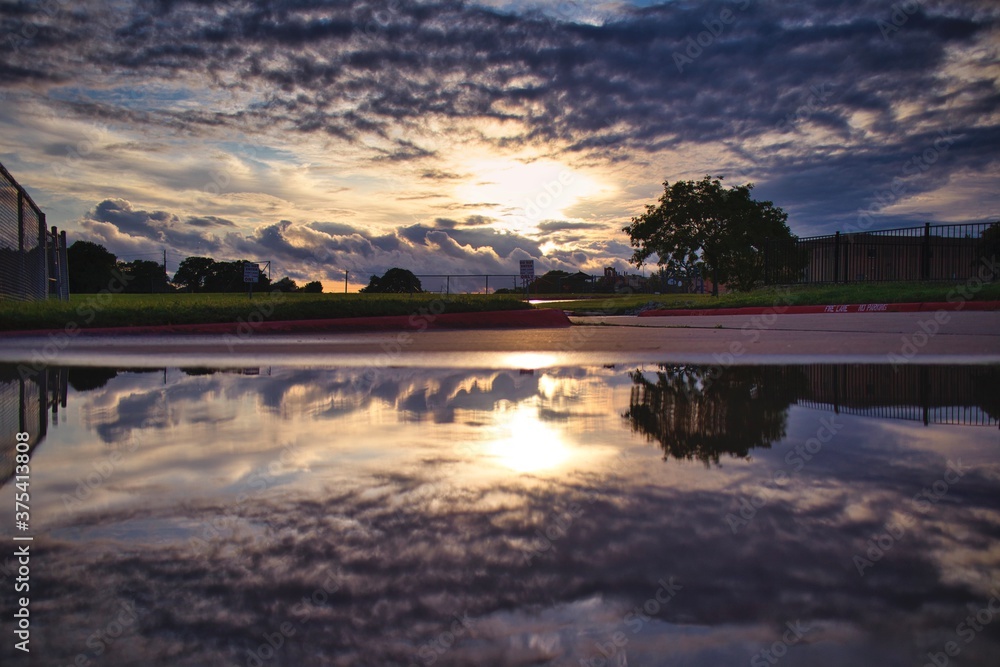 Sunset in Texas after a Hard Rain With Reflection in the Street
