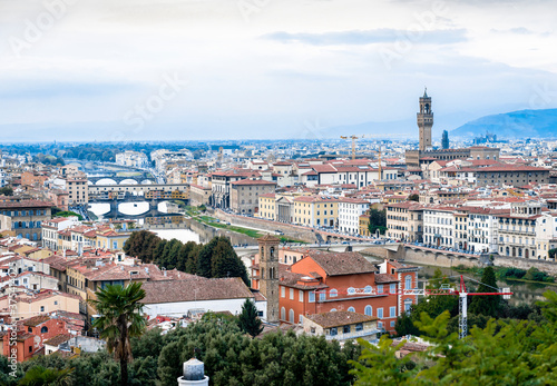 View of the Arno river with bridges and the city of Florence, Tuscany, Italy, in the evening © Sergey