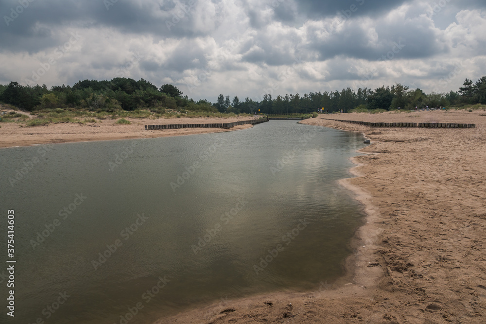 Jamienski Nurt water channel connecting the Baltic Sea with Lake Jamno near Mielno, Zachodniopomorskie, Poland