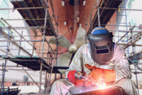 Welding process ship repair at floating dry dock in shipyard