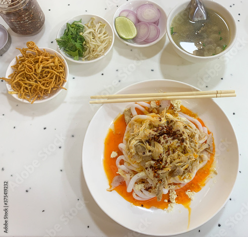 Nan Gyi Thohk Authentic Burmese Thick Rice Noodle Dish (ID: 375419232)