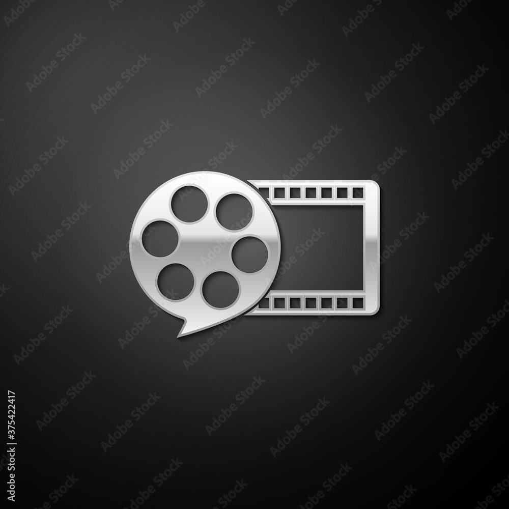 Silver Film reel and play video movie film icon isolated on black background. Long shadow style. Vector. Silver Film reel and play video movie film icon isolated on black background. Long shadow style. Vector.