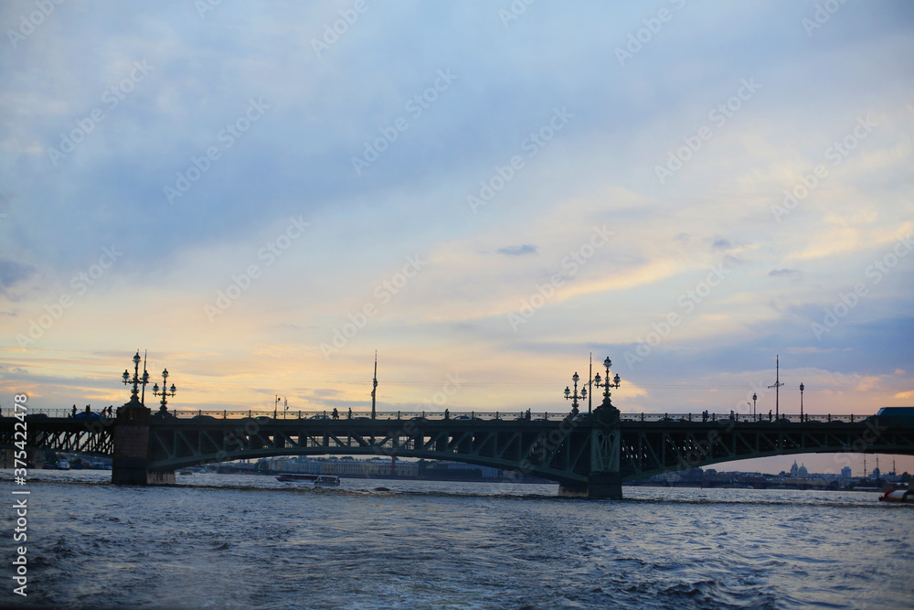 Beautiful historic St. Petersburg panorama view of city architecture heritage from the Neva river with dramatic sky. 