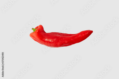 Detail of a nice red peppers on a white background.
