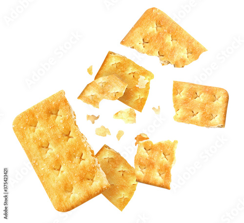 Crushed crackers and crumbs on white background