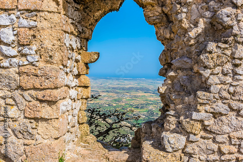 Fototapeta Naklejka Na Ścianę i Meble -  The view from a defensive opening in Kantara Castle over the Mesaoria Plain, Northern Cyprus