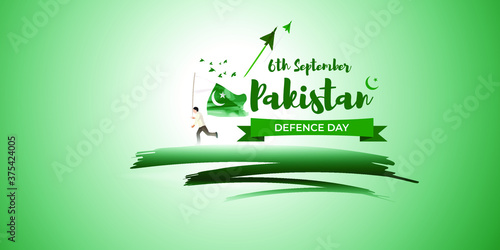 Vector illustration of Pakistan defence day, 6th september, boy with pakistan flag, birds and airforce craft.