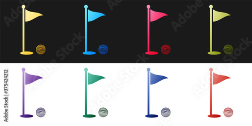 Fotografie Set Golf ball and hole with flag icon isolated on black and white background