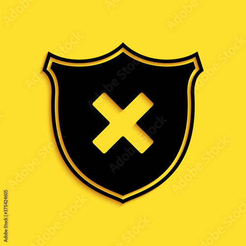 Black Shield and cross x mark icon isolated on yellow background. Denied disapproved sign. Protection, safety, security concept. Long shadow style. Vector.