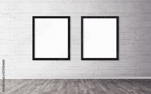 Two white posters with frame on wall. Mock up for you design preview. Good use for advertasing materials.