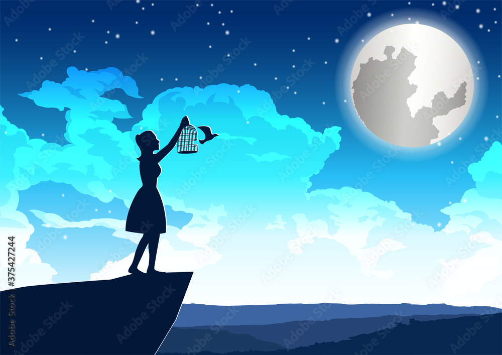 woman let bird out to peace on the cliff in beautiful night