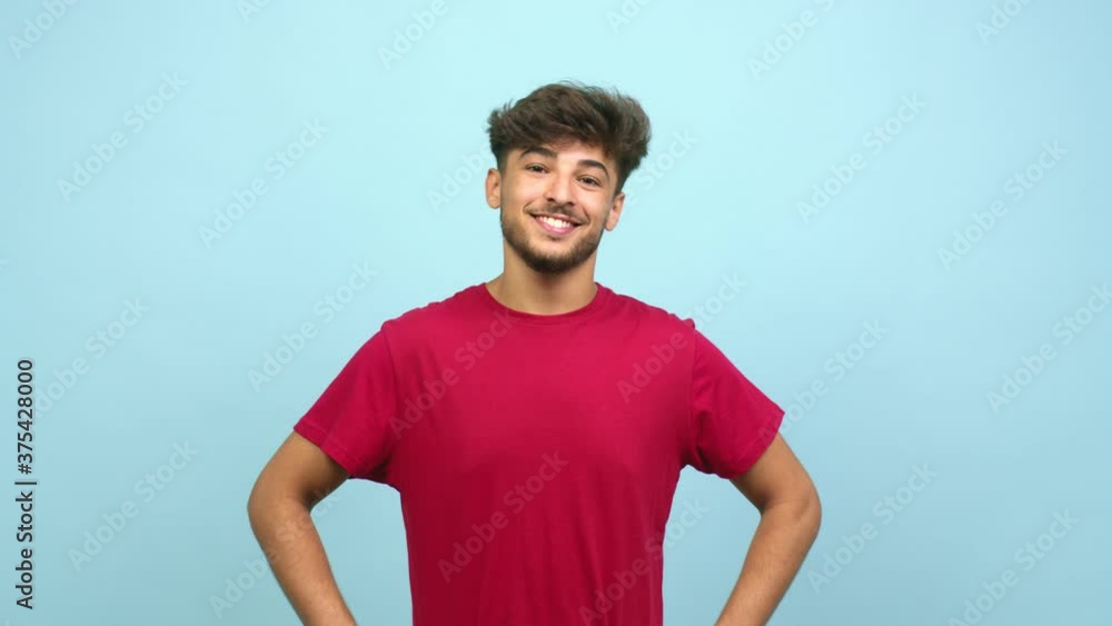 Young arab man cheerful and with a big smile, confident, friendly and sincere, expressing positivity and success Young arab man cheerful and with a big smile, confident, friendly and sincere, expressing positivity and success