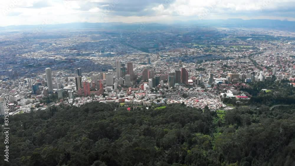 Bogota, Colombia city revealed from Mountain Monseratte with a 4K Drone. Bogota, Colombia city revealed from Mountain Monseratte with a 4K Drone.