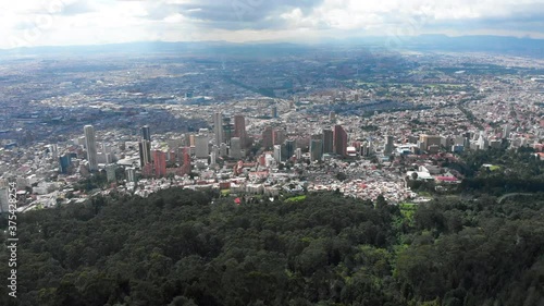 Bogota, Colombia city revealed from Mountain Monseratte with a 4K Drone. photo