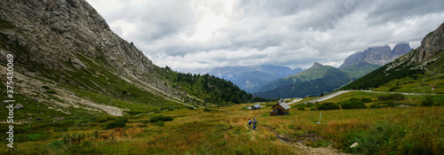 Italian alps view from Sass Pordoi on a cloudy summer day, Sudtirol, Trentino Alto Adige, Dolomites, Unesco, Italy
