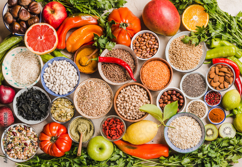 Healthy food assortment  various vegetables  fruits  legumes  grains  and superfoods concept of vegetarian diet.