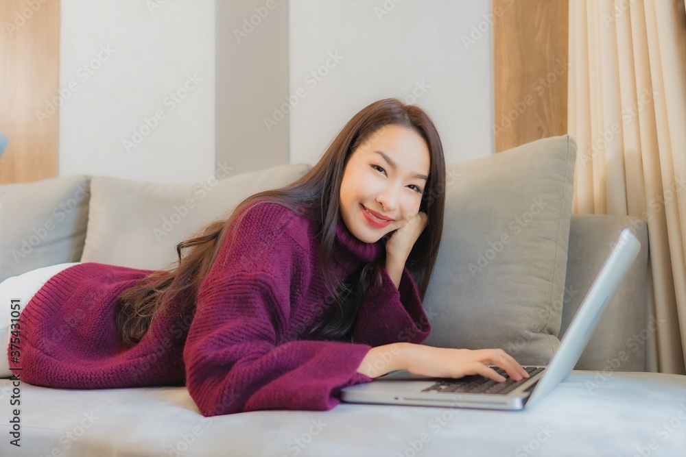 Portrait beautiful young asian woman use computer laptop with credit card Portrait beautiful young asian woman use computer laptop with credit card