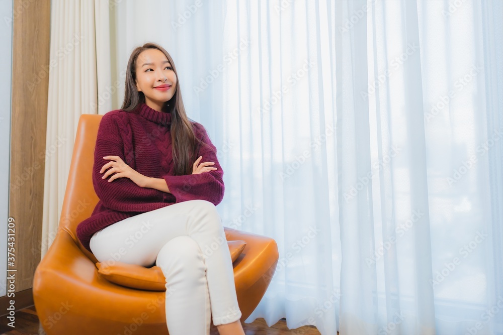Portrait beautiful young asian woman smile relax on sofa Portrait beautiful young asian woman smile relax on sofa
