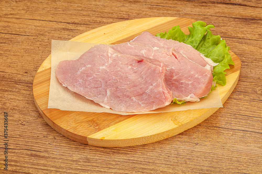 Raw pork steak for cooking