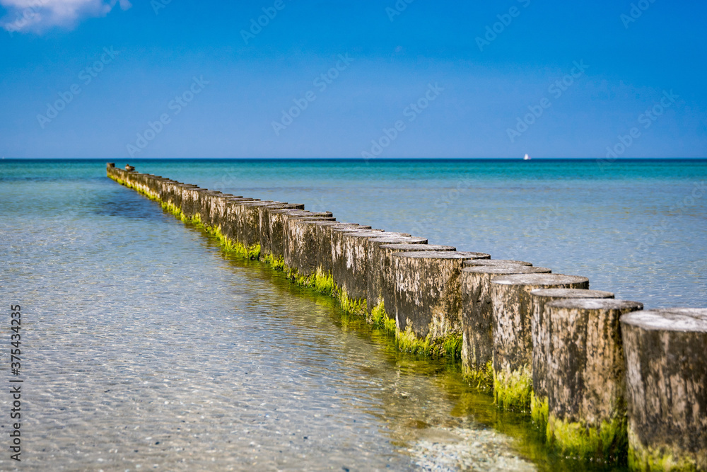 wooden pier on the beach