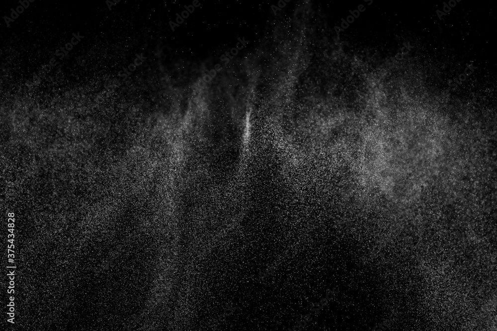 Fototapeta premium Abstract splashes of water on black background. Freeze motion of white particles. Rain, snow overlay texture.