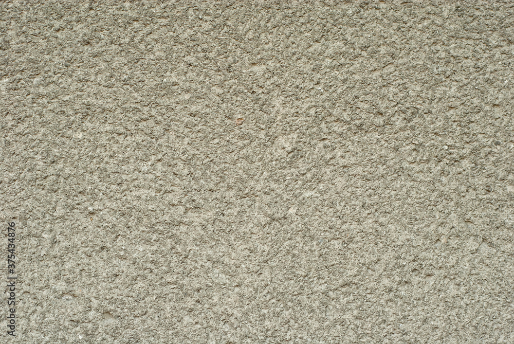 Fototapeta premium Plaster on a white wall. Concrete wall texture close up.