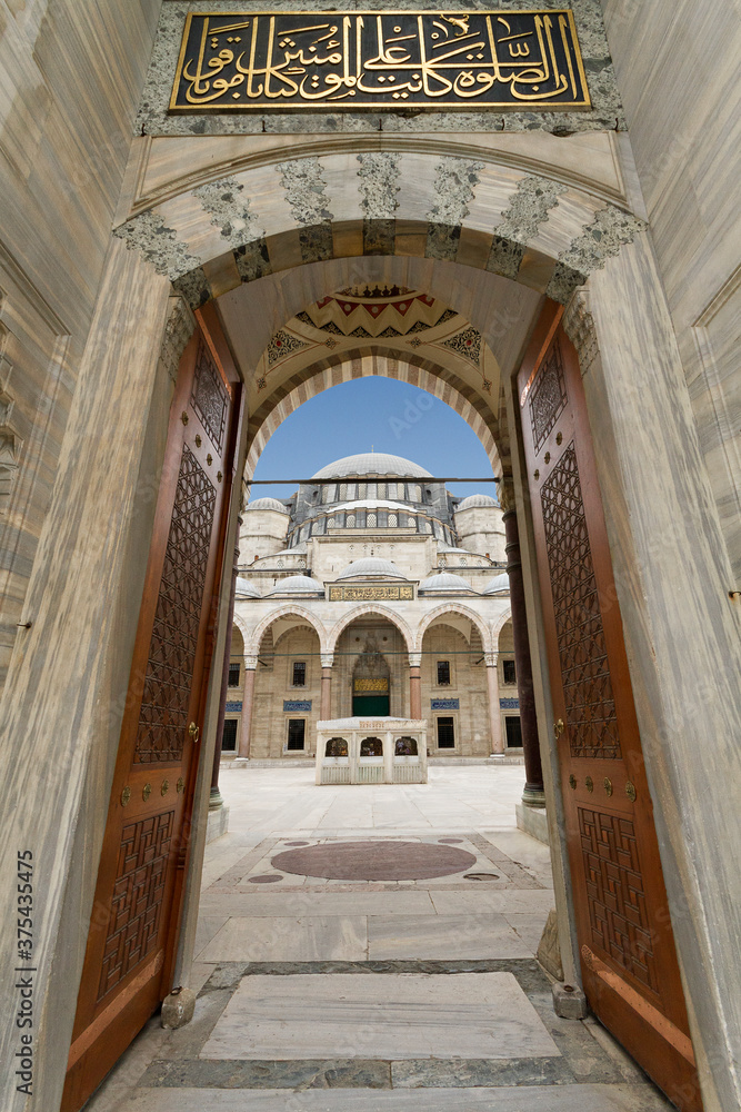 Suleymaniye Mosque through its gate, in Istanbul, Turkey.