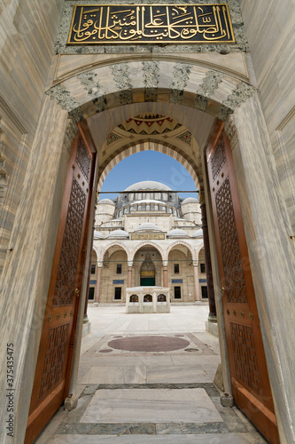 Suleymaniye Mosque through its gate  in Istanbul  Turkey.