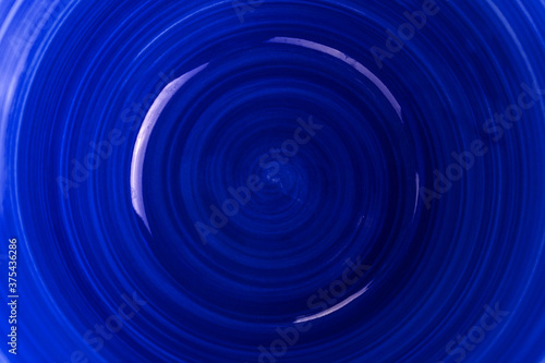  Background, ceramic plate in blue.