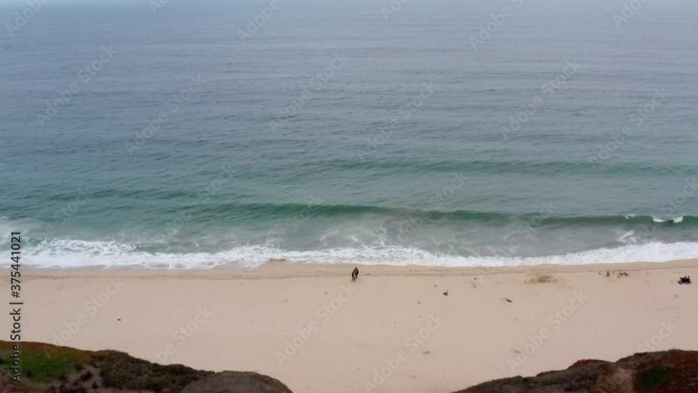 AERIAL: drone, half moon bay beach cliffs and shore, flying away view AERIAL: drone, half moon bay beach cliffs and shore, flying away view