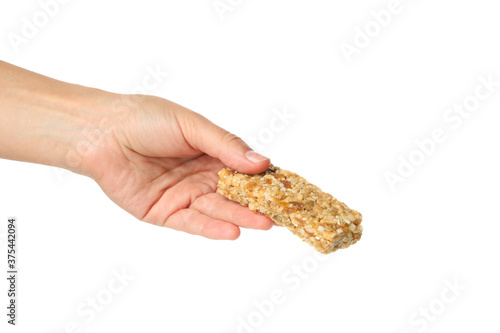 Female hand hold granola bar, isolated on white background