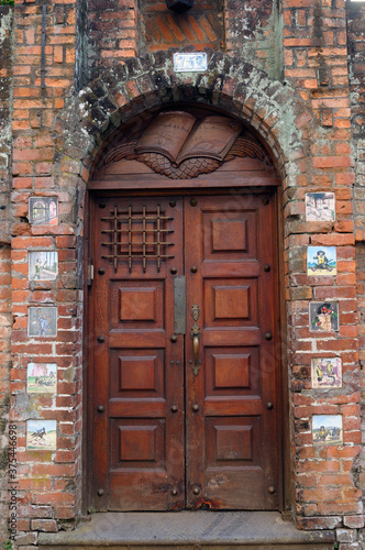 Doorway in Barrio Amon San Jose Costa Rica with tiles of Don Quixote