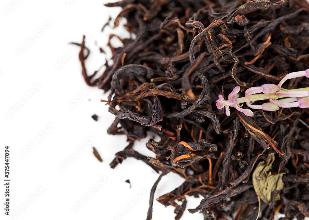 Obraz premium Blooming Chamerion angustifolium (common names: fireweed, great willowherb, rosebay willowherb) flower on a heap of herbal tea isolated on a white background.