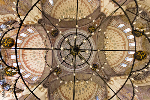 Domes of the Historical New Mosque known also as Yeni Cami mosque in Istanbul, Turkey photo