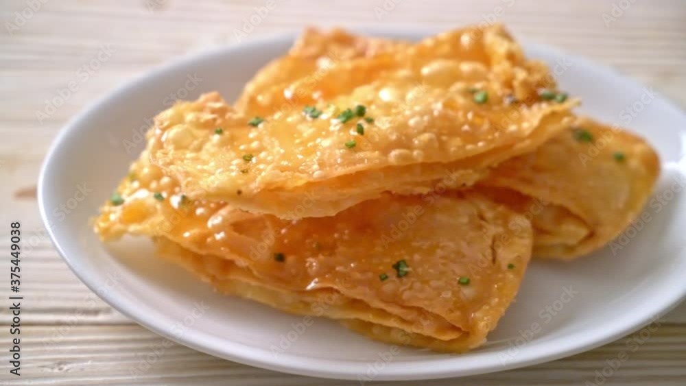 crispy roti with sugar on plate crispy roti with sugar on plate