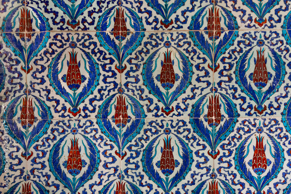 Iznik tiles with tulip design in the Historical Rustem Pasa Mosque, in Istanbul, Turkey.