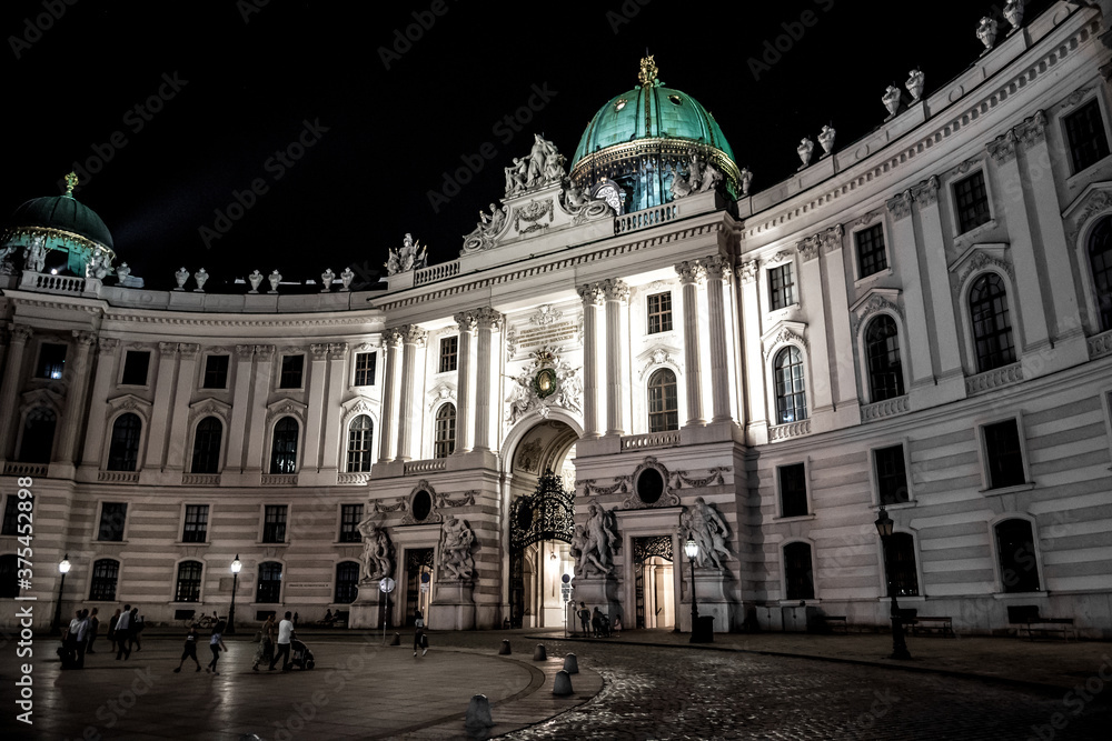 Illuminated Entrance Portal To Imperial Residence Hofburg In The Inner City Of Vienna In Austria