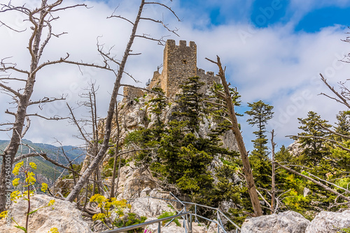 A panorama view looking upwards towards Saint Hilarion Castle, Northern Cyprus from the lower levels photo