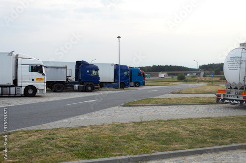 Large cars in the overnight parking lot photo