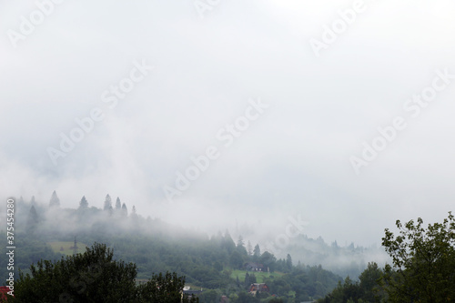 mountain landscape in the fog © Сергей Луговский