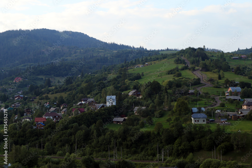 small village in the mountains in summer small village in the mountains in summer