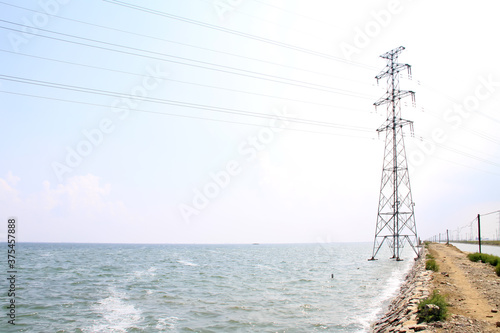 electric tower at the beach under blue sky