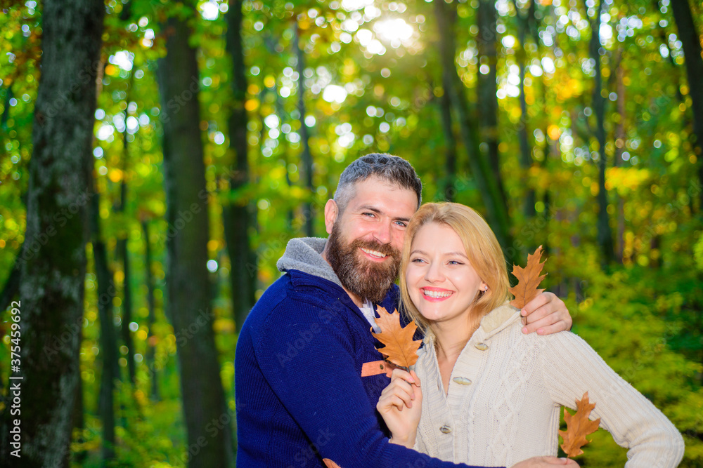 Autumn couple. Couple in forest. Happy family outdoor. Autumn background. Beautiful autumn woman. Autumn park. Leaf fall. Sunny day. Autumn couple. Couple in forest. Happy family outdoor. Autumn background. Beautiful autumn woman. Autumn park. Leaf fall. Sunny day.