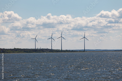 Onshore wind turbines on the cost of Baltic sea.
