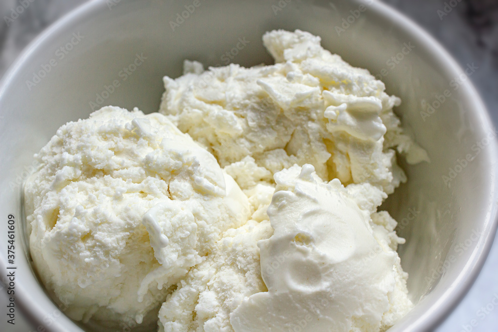 Homemade lemon ice cream in a bowl Homemade lemon ice cream in a bowl