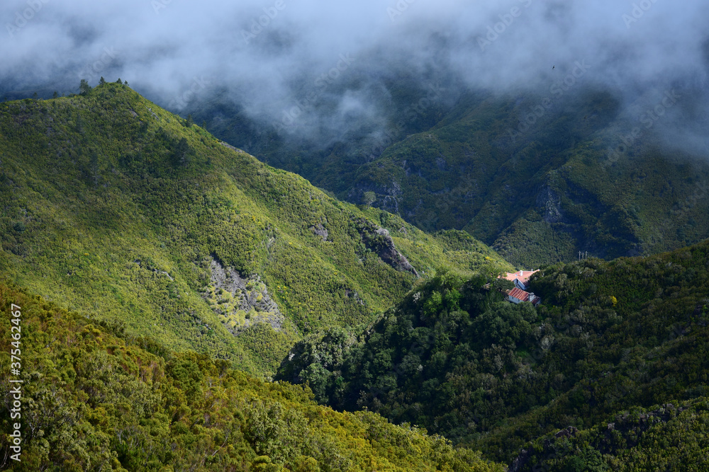 A valley with clouds coming in at forester's house Rabacal, Madeira, Portugal.