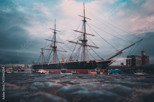 Fotografie HMS Warrior Birthed in Portsmouth Harbour shot from a low angle