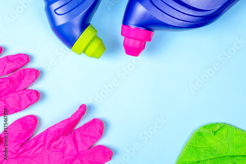 Set of cleaning supplies on light background. Cleaning concept. Disinfection in the coronavirus pandemic. Copy space for design.