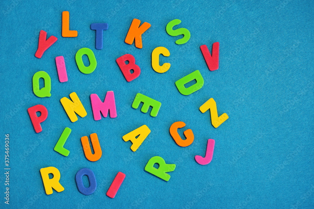 Fototapeta premium Textured colorful letters, mess of alphabet 